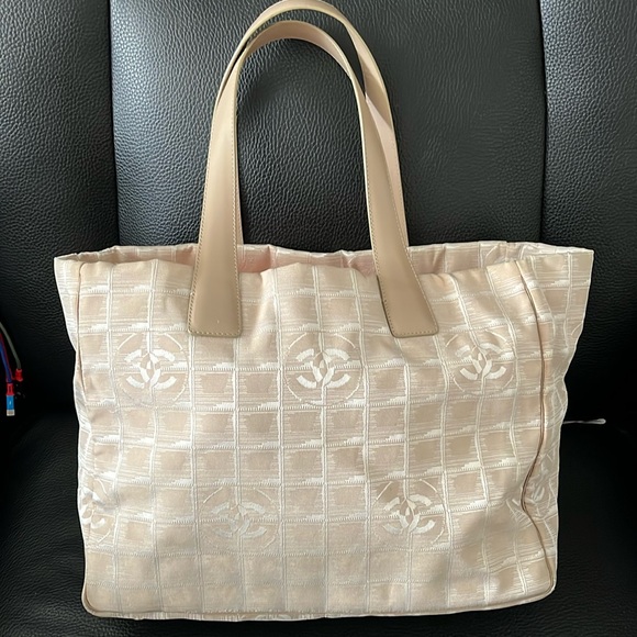 CHANEL Handbags - CHANEL Tote Bag New Travel
Line Beige Nylon